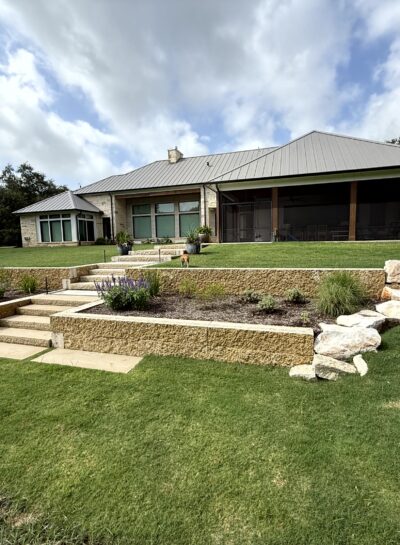 Modern Landscaping With Stone Steps And Tranquil Water Feature